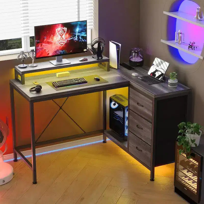 Bureau de jeu en L avec lumières LED, prises électriques, tiroirs et étagères, bureau d'angle pour ordinateur pour bureau à domicile, noir