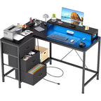 Bureau de jeu en L avec lumières LED, prises électriques, tiroirs et étagères, bureau d'angle pour ordinateur pour bureau à domicile, noir
