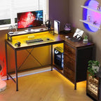 Bureau de jeu en L avec lumières LED, prises électriques, tiroirs et étagères, bureau d'angle pour ordinateur pour bureau à domicile, noir