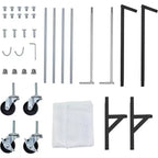 Portant à vêtements en Z sur roulettes, base orange ou noire, poteaux argentés, 2 housses de protection, pour présentation en magasin ou rangement dans un placard.