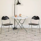 Lot de 2 chaises pliantes en métal et vinyle noir avec poignée de transport